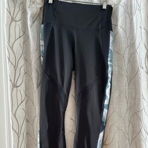 Athleta leggings, full length, high-rise waistband, and side pattern.